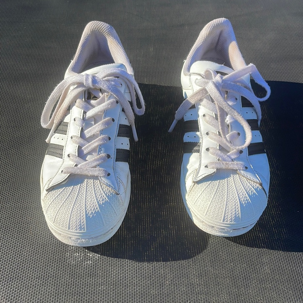 Adidas Superstar black and white tennis shoes, size 4 1/2